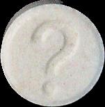 White Question Mark pill — lab-tested sample