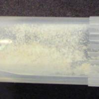 Tan #4 pill — lab-tested sample